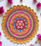 Bright crochet mandala doily table mat