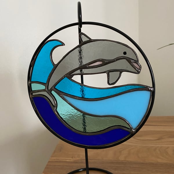 Leaping dolphin ocean waves stained glass display panel