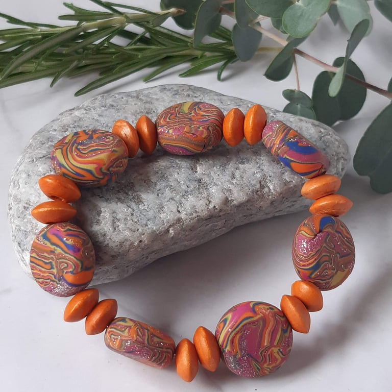 Handmade orange mix polymer clay disc bead bracelet