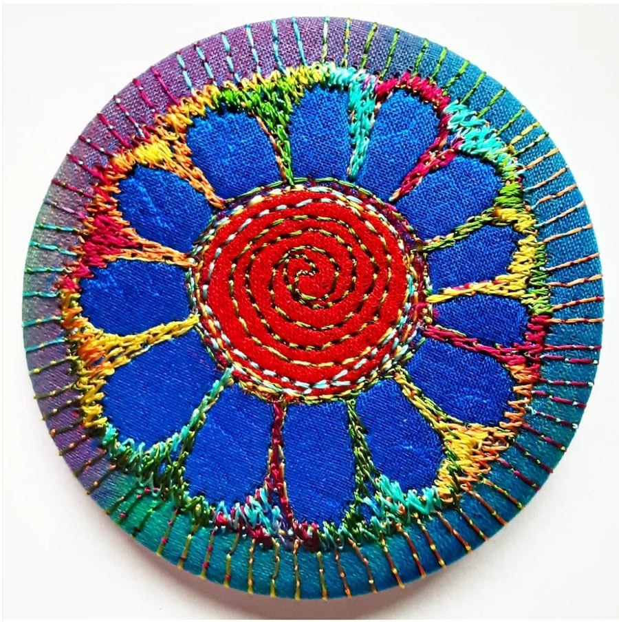 58mm Fabric Badge with Free Machine Embroidery Blue and Red Flower 