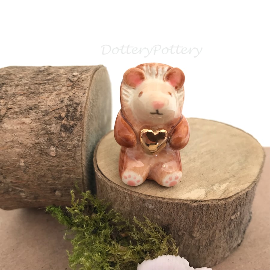 Tiny adorable hedgehog figure