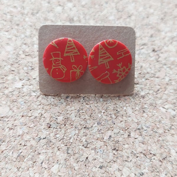 Studs with golden festive designs screen printed on