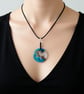 Round crystallised fish pendant necklace