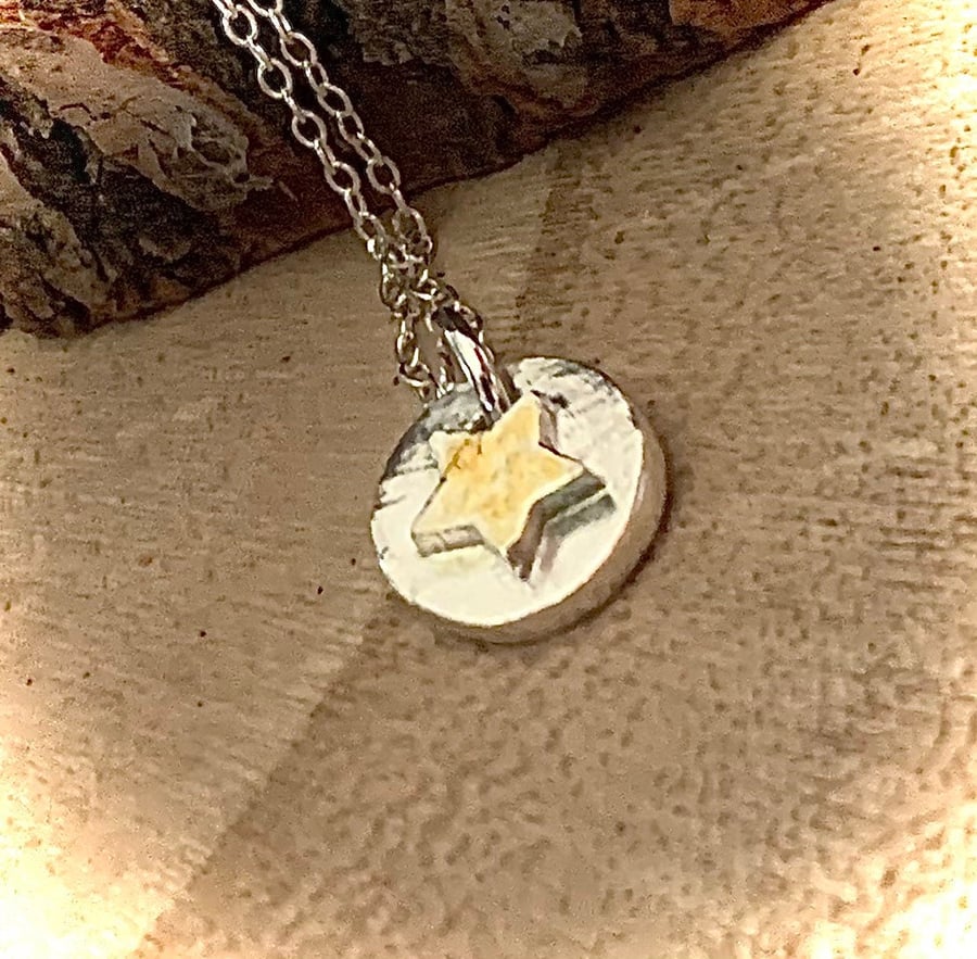 Handcrafted unique silver round pendant with gold star