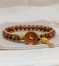Goldstone and metallic gold leather bracelet with wooden button fastener  - Image 7