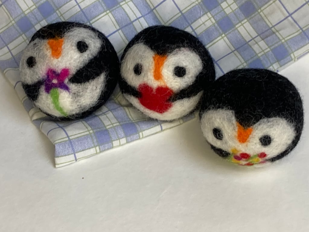 Wool tumble dryer balls. Energy saving and plastic free. Three penguins
