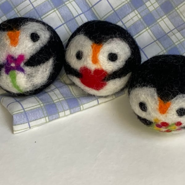 Wool tumble dryer balls. Energy saving and plastic free. Three penguins