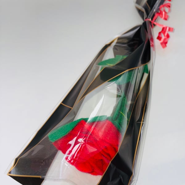 Long steamed felt red rose