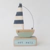 Handmade little wooden sail boat