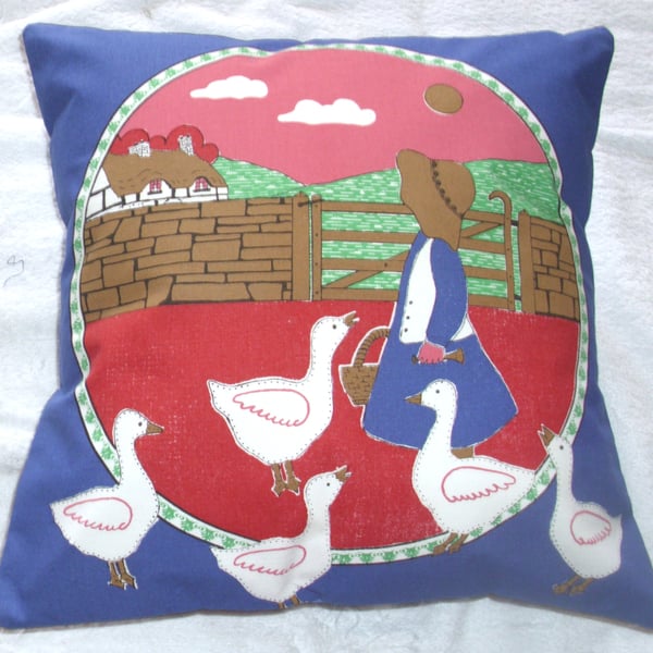 Little Goosegirl with her geese cushion