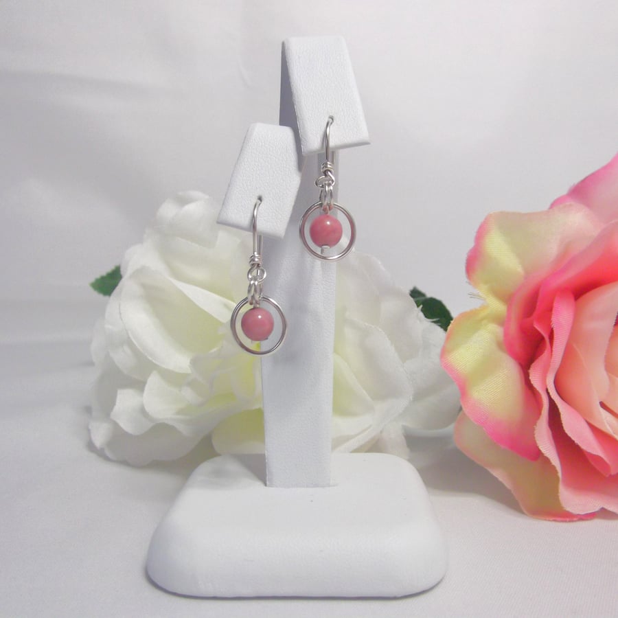 Rhodonite gemstone dangle earrings with bead in a ring of recycled silver