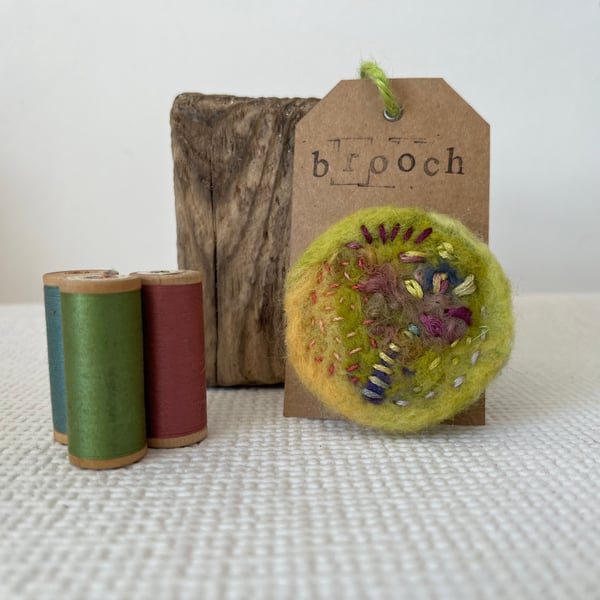 Needle felted hand embroidered circular brooch 