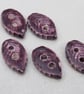 5 Small Leaf Shaped Aubergine Purple Ceramic Buttons - Image 1
