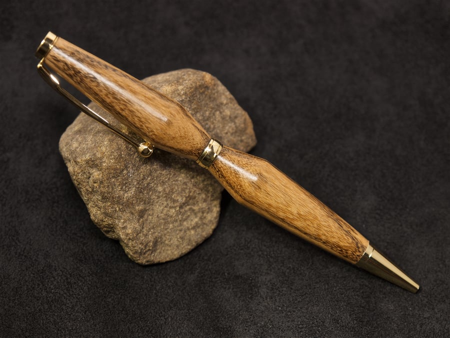 Hand made yew wood twist-pen. R5,5