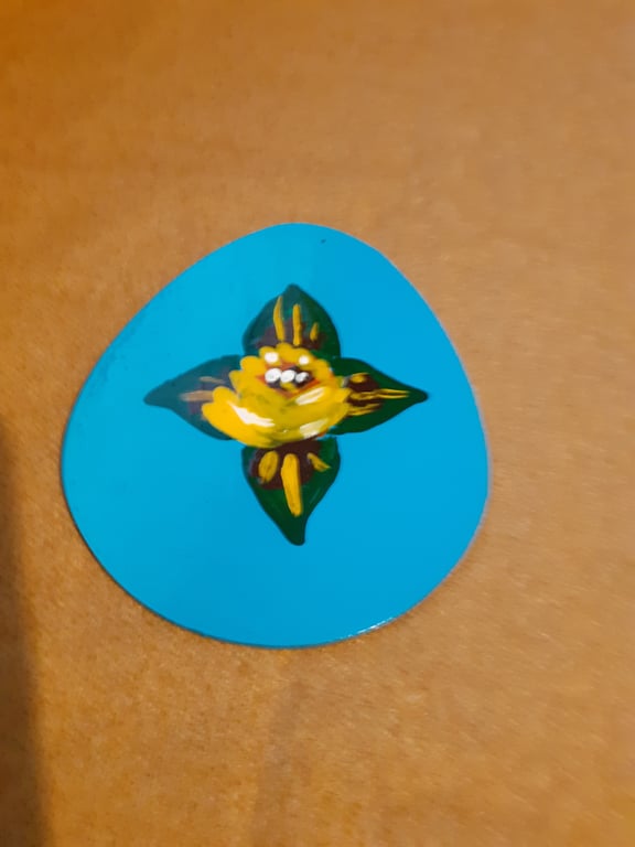 Egg shaped wooden magnet with canal art style rose