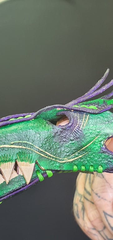 Dragon head finger puppet.  Green and purple 