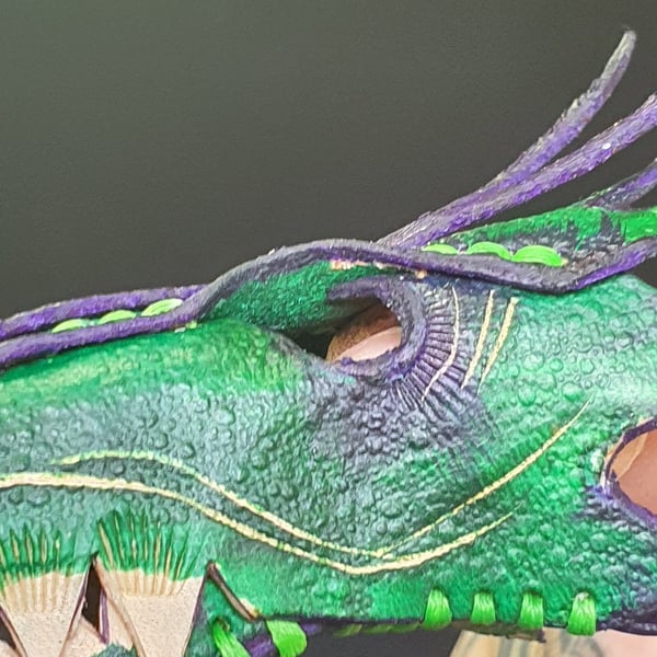 Dragon head finger puppet.  Green and purple 
