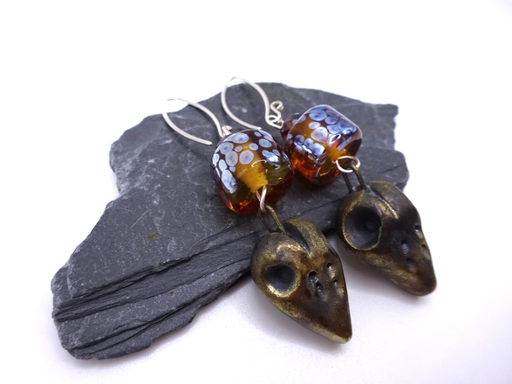 lampwork glass amber earrings, ceramic bird skull