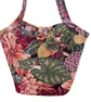 Bucket bags exotic flowers and leaves
