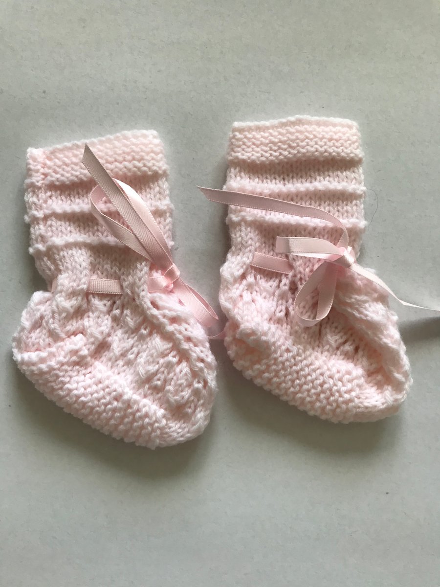 Hand knitted baby bootees