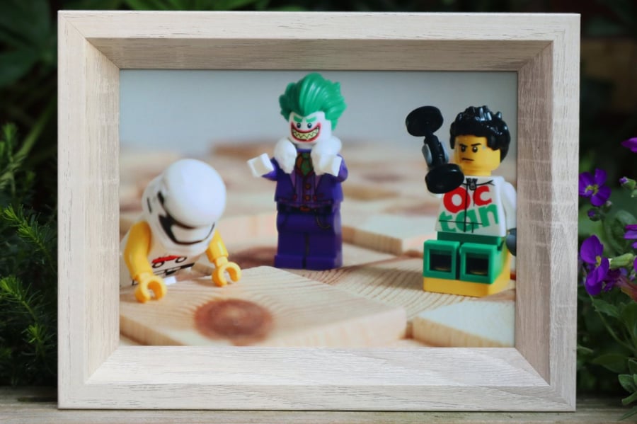 Framed photo of Lego figures, Get down and give me 10, Joker, Stormtrooper and r