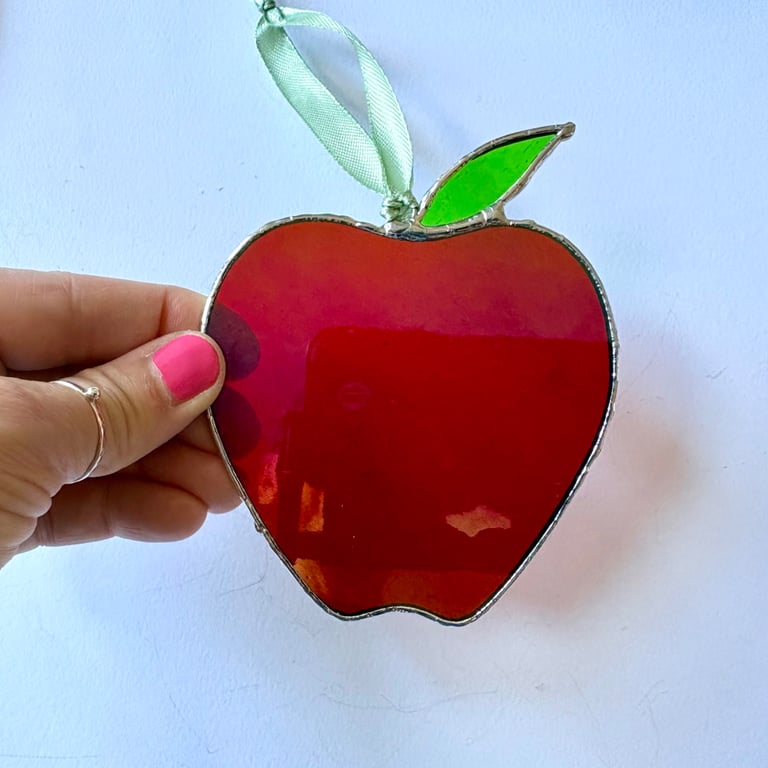Iridescent stained glass red apple with a leaf suncatcher