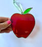 Iridescent stained glass red apple with a leaf suncatcher