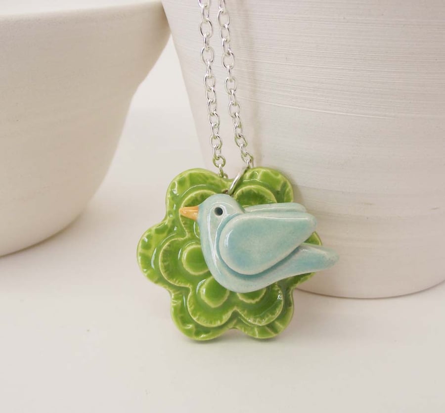 Ceramic flower and bird pendant