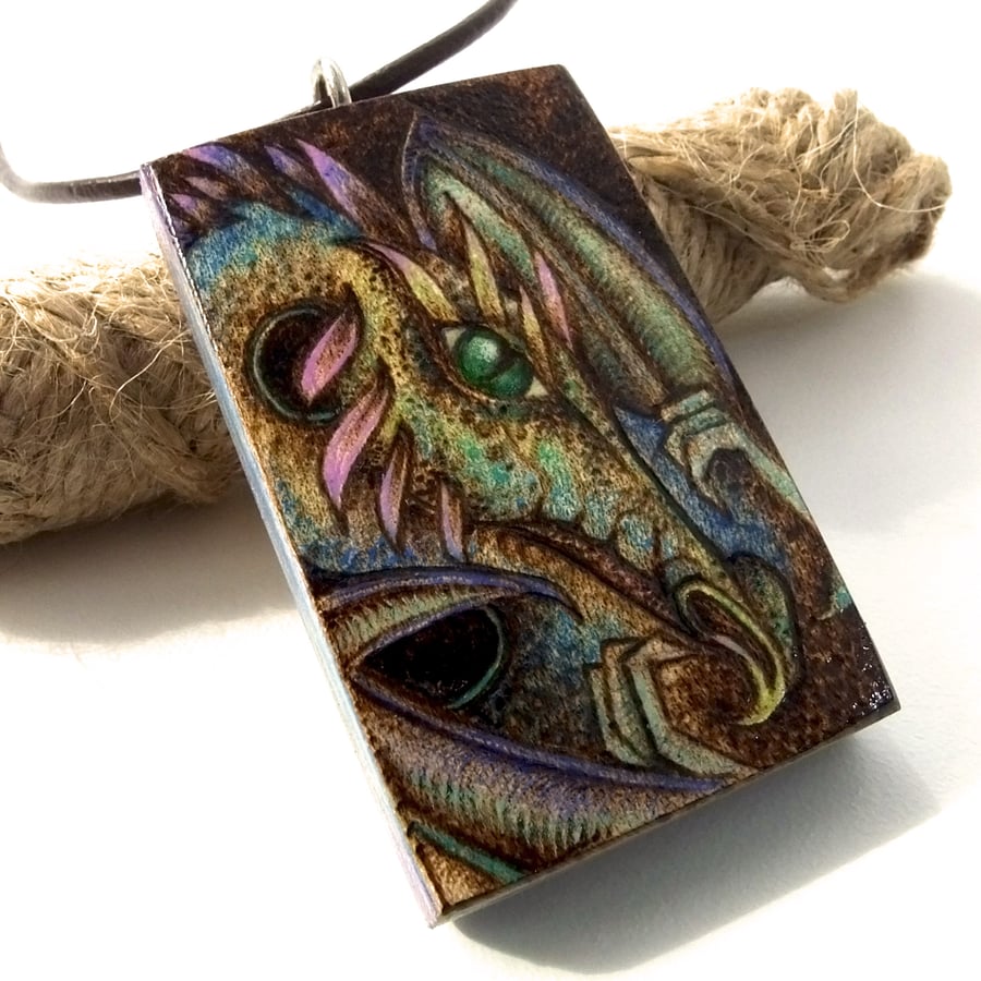 Rainbow Dragon Pyrography Pendant. Fantasy necklace in sycamore.