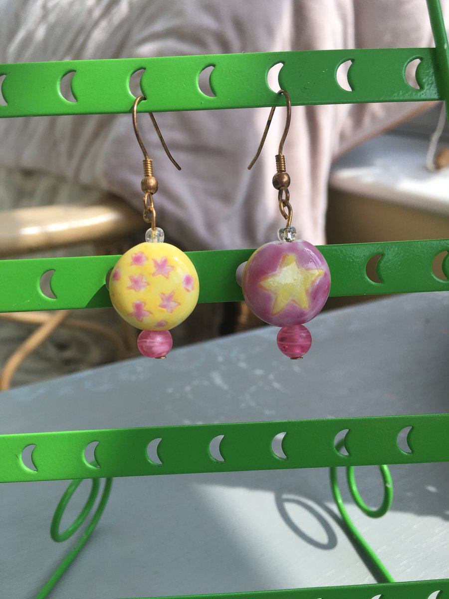 Ceramic stars pink and yellow beaded earrings.
