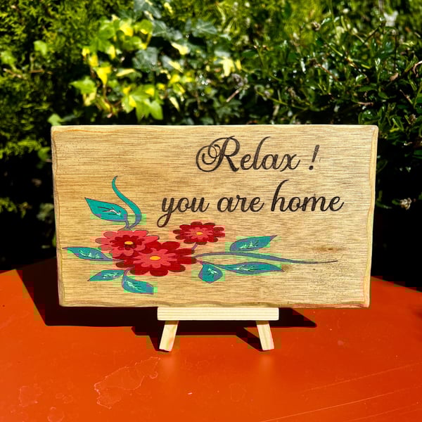 Relax. You are home wooden sign