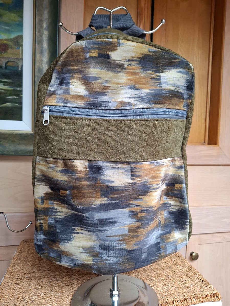 Distressed khaki denim backpack