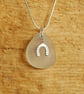 Little white beach glass pendant with horseshoe charm - Image 1