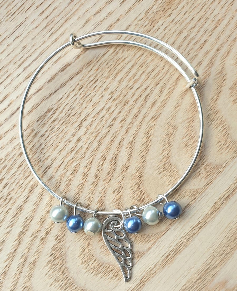 Blue and Imitation Pearl Glass Beads with Wing Charm Bangle