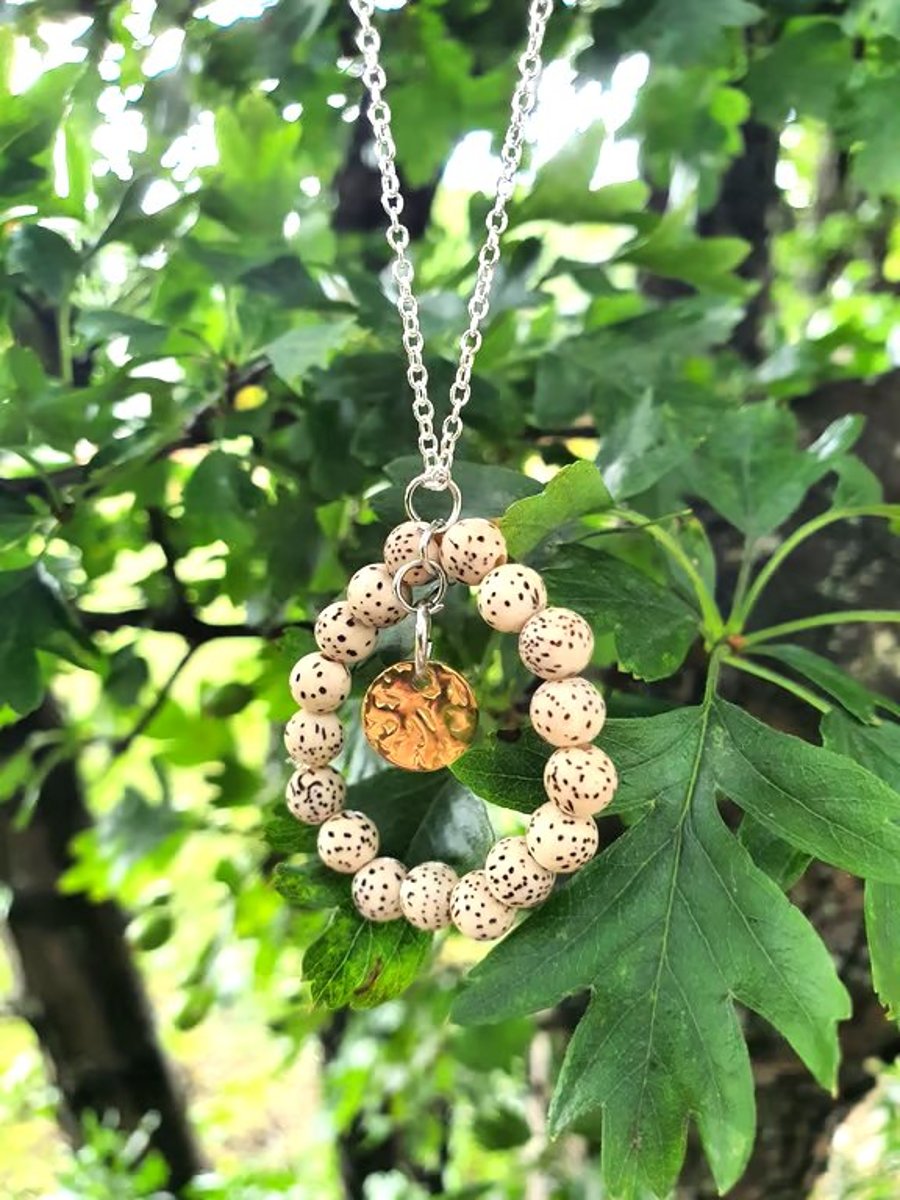 Bodhi bead round pendant with gold disc 
