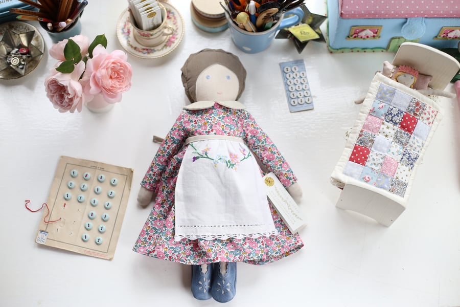 Liberty Heirloom Doll with vintage linen apron.