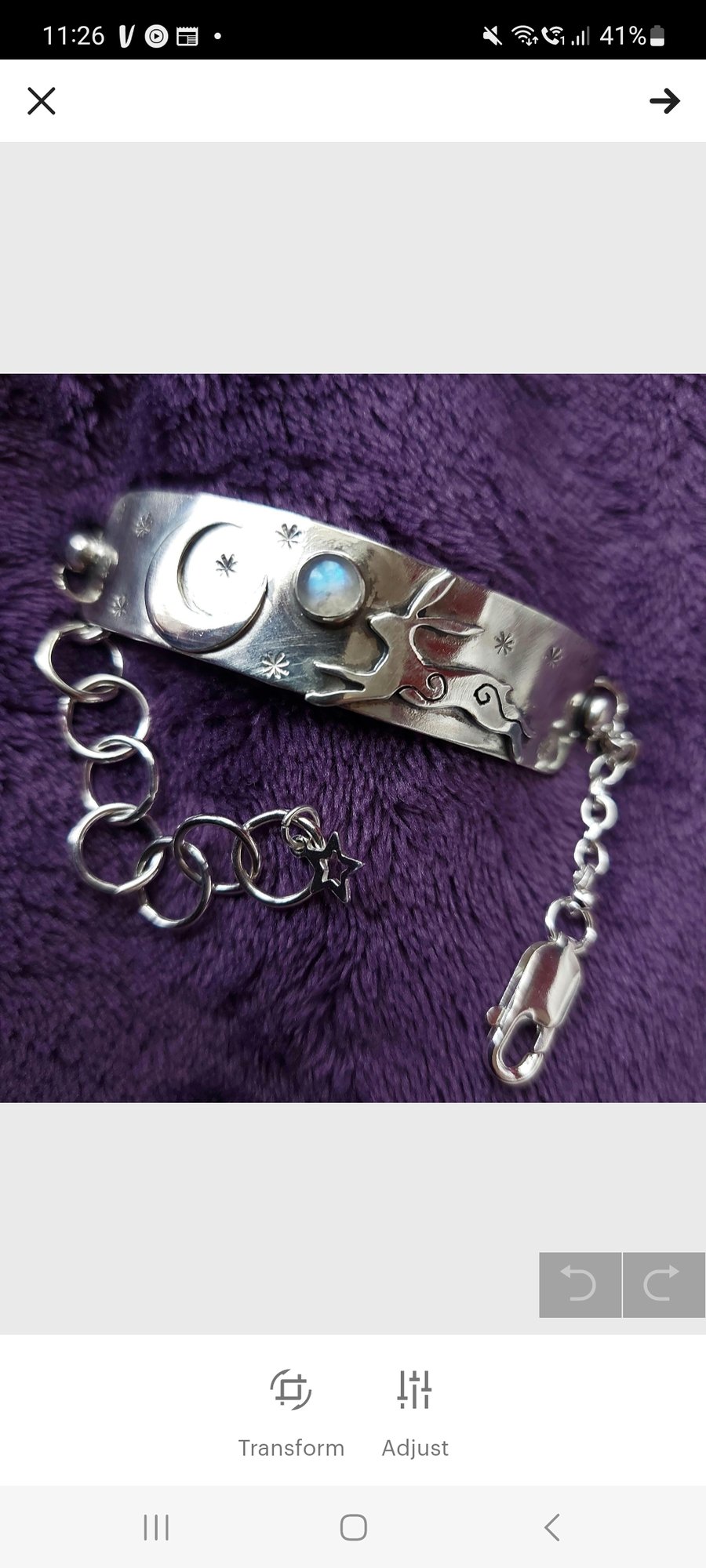 Silver hare and moon bracelet with moostone and charms