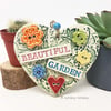 Ceramic heart decoration with button flowers Beautiful garden 