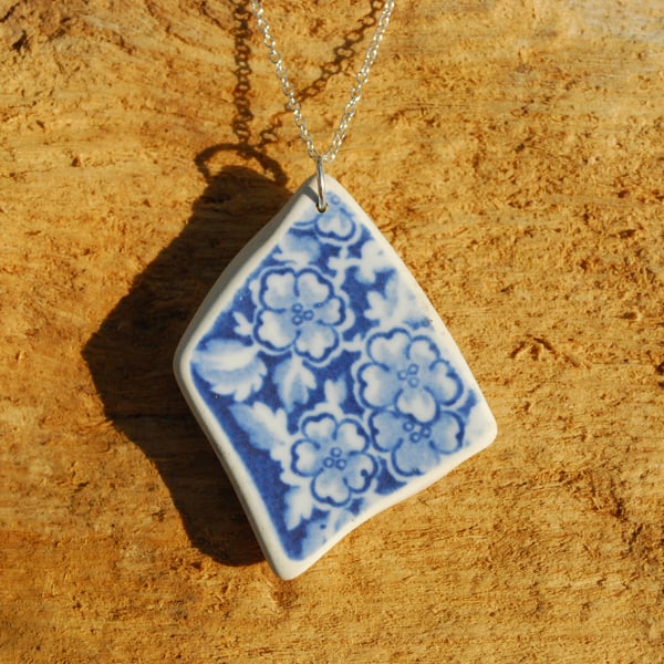 Blue flowers beach pottery pendant