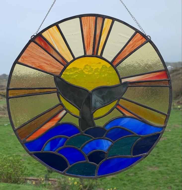 Diving Whale at Sunset 