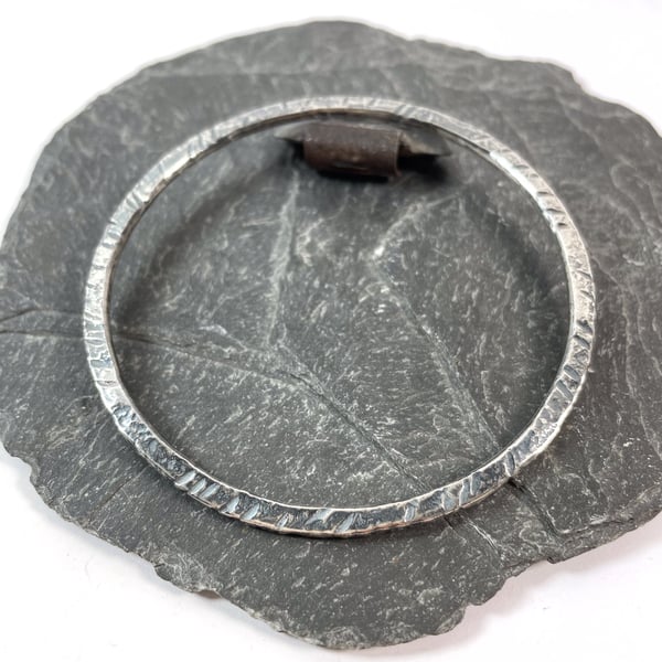 Round oxidised Sterling silver bangle with beaten texture