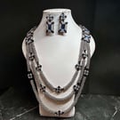 Delenn Handmade Seed Bead and Crystal Triple Necklace and earrings set