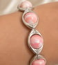 Rhodochrosite stretchy beaded bracelet with silver colured connectors - Image 2