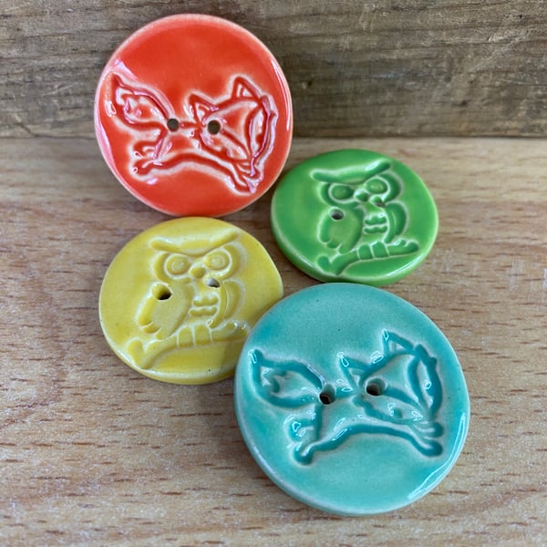 Set of four handmade ceramic buttons owls and foxes