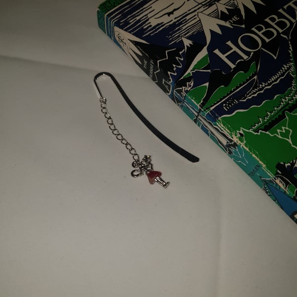 Metal bookmark with fairy charm