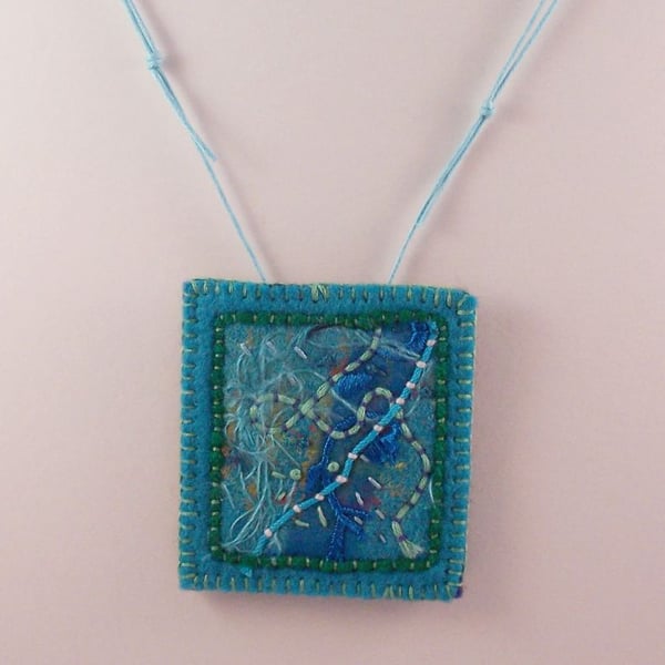 Hand embroidered textile necklace 