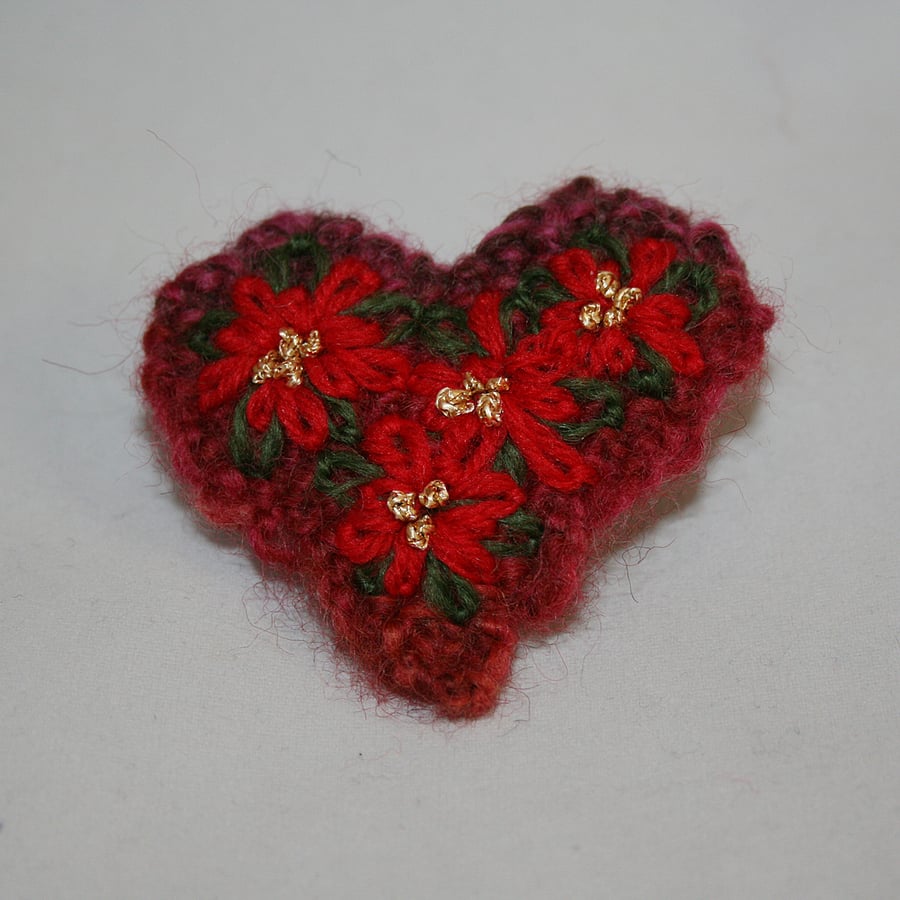 Ponisettia Brooch - Embroidered on a knitted Heart