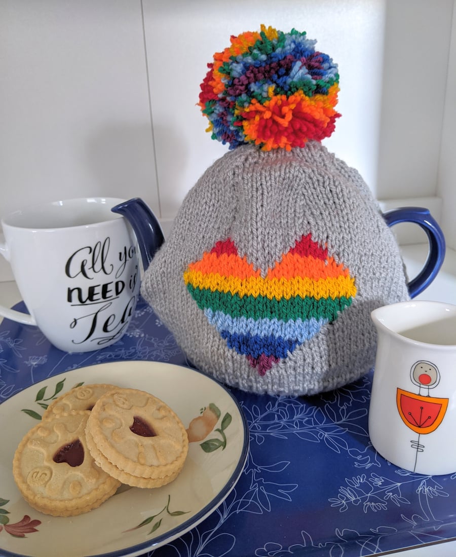 Rainbow heart knitted tea cosy
