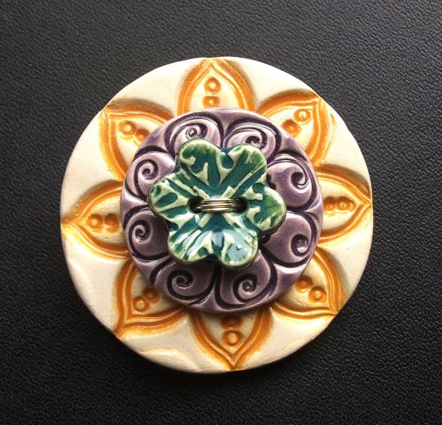SALE Ceramic brooch with flower button.