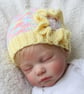 Hand-Knitted Baby Hat, Newborn to 3 Months, Pastel Baby Beanie, Flower Applique  - Image 1